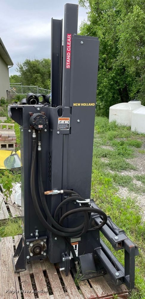 image for item JC9872 2014 New Holland  skid steer post driver