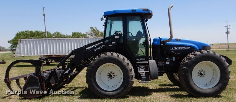 image for item LS9185 2002 New Holland TV140  4WD bi-directional tractor