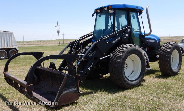 image for item LS9185 2002 New Holland TV140  4WD bi-directional tractor