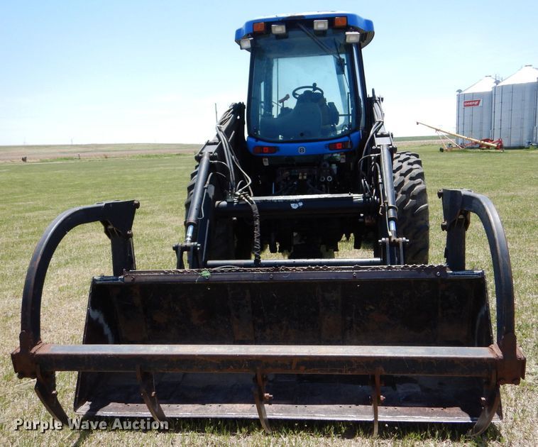 image for item LS9185 2002 New Holland TV140  4WD bi-directional tractor