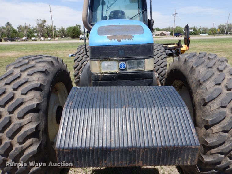 image for item LS9185 2002 New Holland TV140  4WD bi-directional tractor