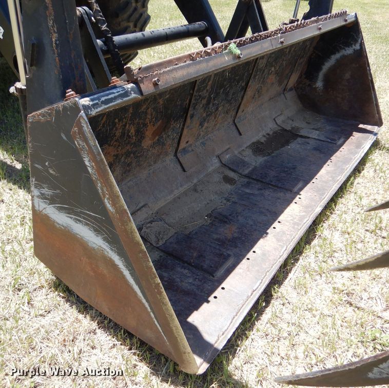 image for item LS9185 2002 New Holland TV140  4WD bi-directional tractor