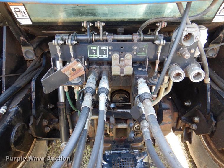 image for item LS9185 2002 New Holland TV140  4WD bi-directional tractor