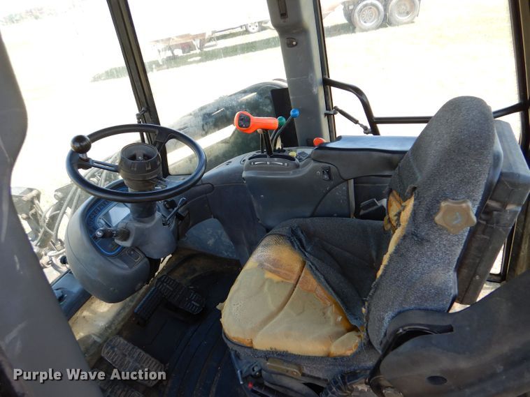 image for item LS9185 2002 New Holland TV140  4WD bi-directional tractor