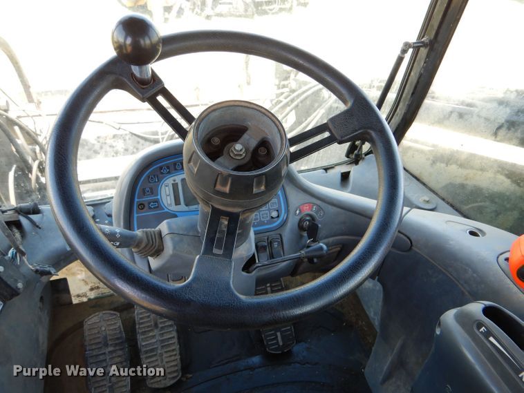 image for item LS9185 2002 New Holland TV140  4WD bi-directional tractor