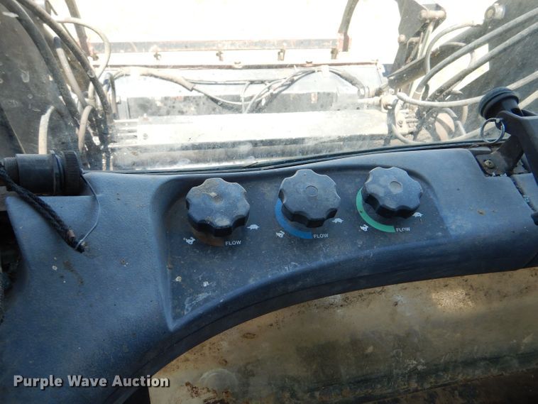 image for item LS9185 2002 New Holland TV140  4WD bi-directional tractor