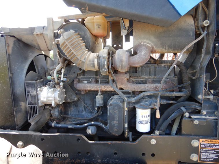 image for item LS9185 2002 New Holland TV140  4WD bi-directional tractor