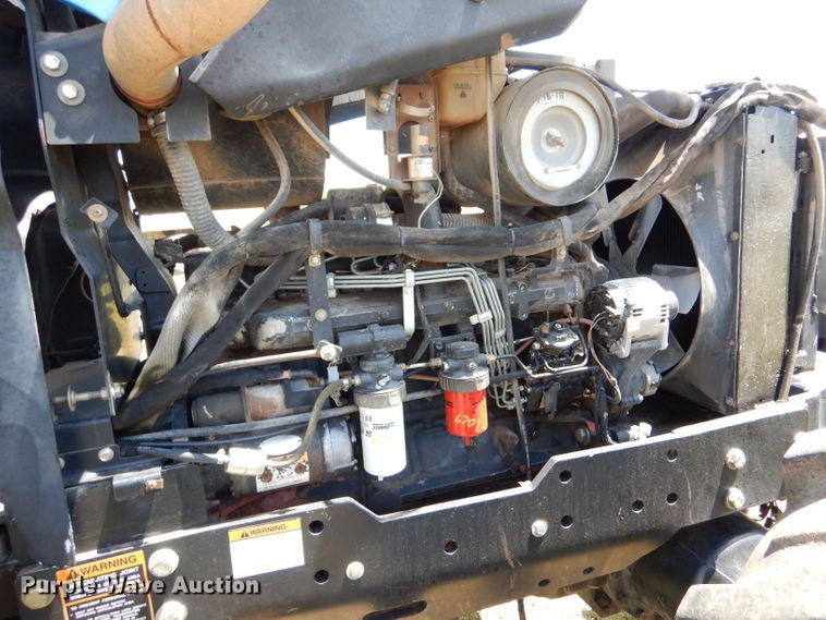 image for item LS9185 2002 New Holland TV140  4WD bi-directional tractor