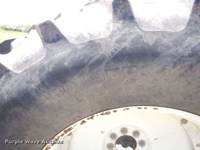 image for item LS9185 2002 New Holland TV140  4WD bi-directional tractor