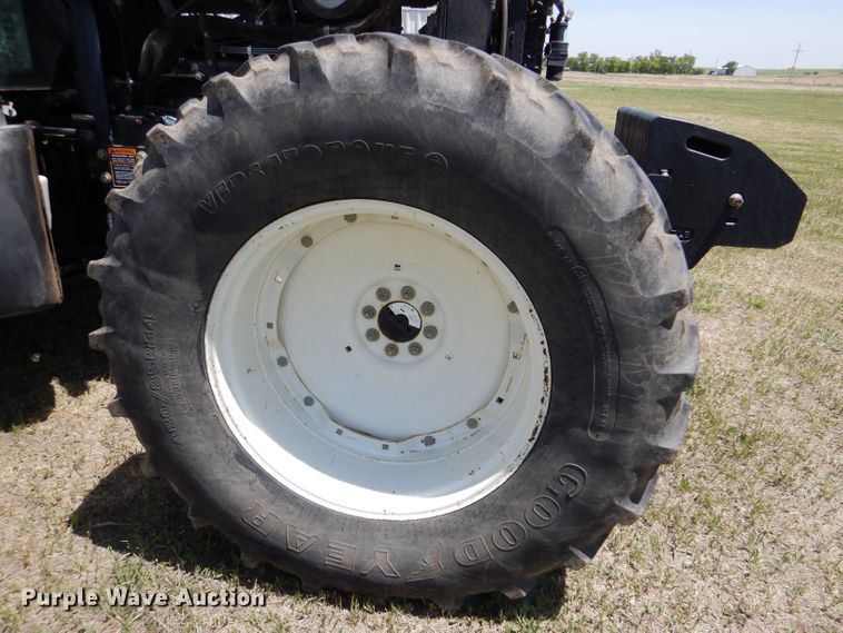 image for item LS9185 2002 New Holland TV140  4WD bi-directional tractor