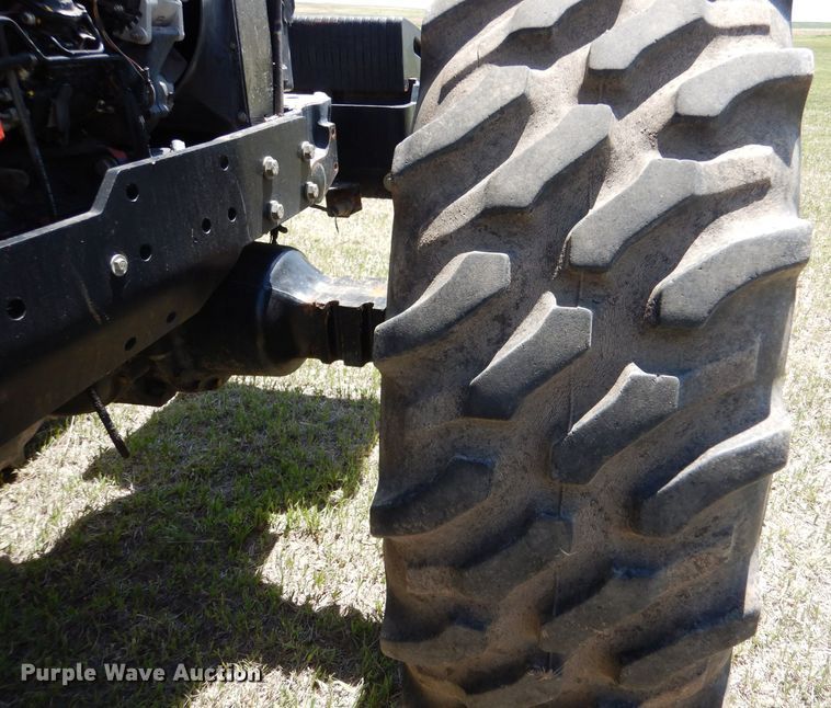 image for item LS9185 2002 New Holland TV140  4WD bi-directional tractor