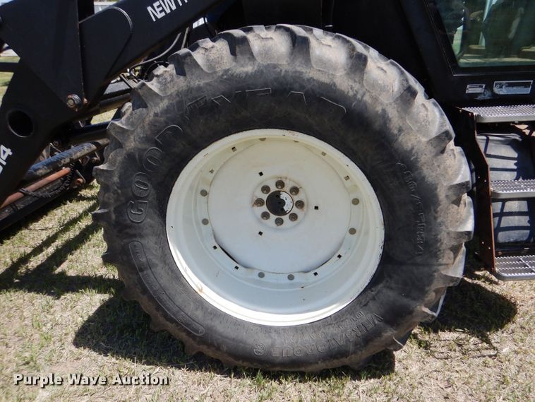 image for item LS9185 2002 New Holland TV140  4WD bi-directional tractor