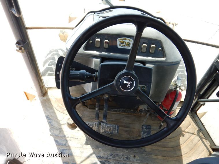 image for item DM7341 2003 John Deere 310SG  backhoe