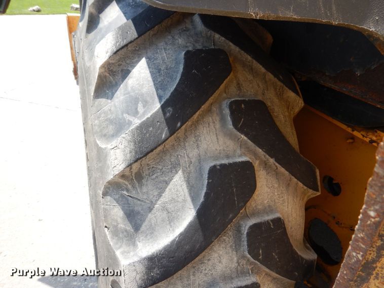 image for item DM7341 2003 John Deere 310SG  backhoe