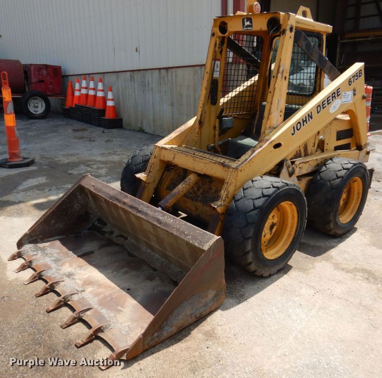 image for item DM7370 John Deere 675B  skid steer loader