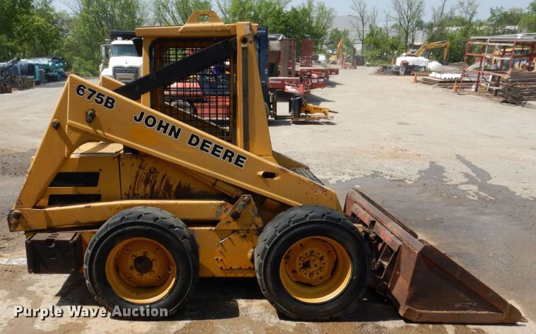 image for item DM7370 John Deere 675B  skid steer loader