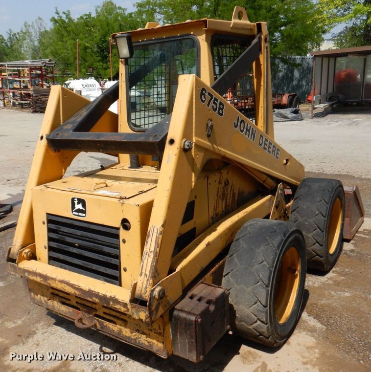 image for item DM7370 John Deere 675B  skid steer loader