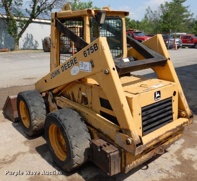 image for item DM7370 John Deere 675B  skid steer loader