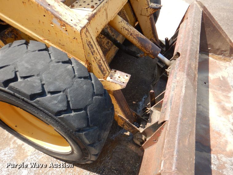 image for item DM7370 John Deere 675B  skid steer loader