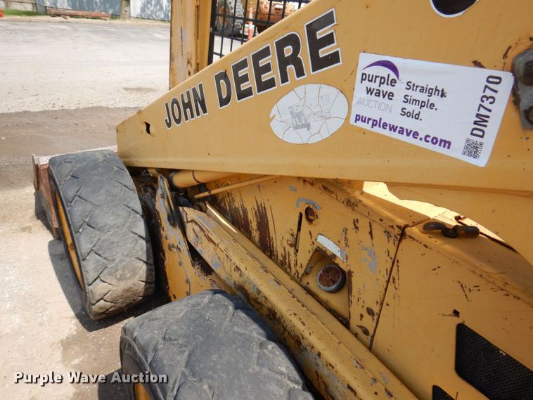 image for item DM7370 John Deere 675B  skid steer loader
