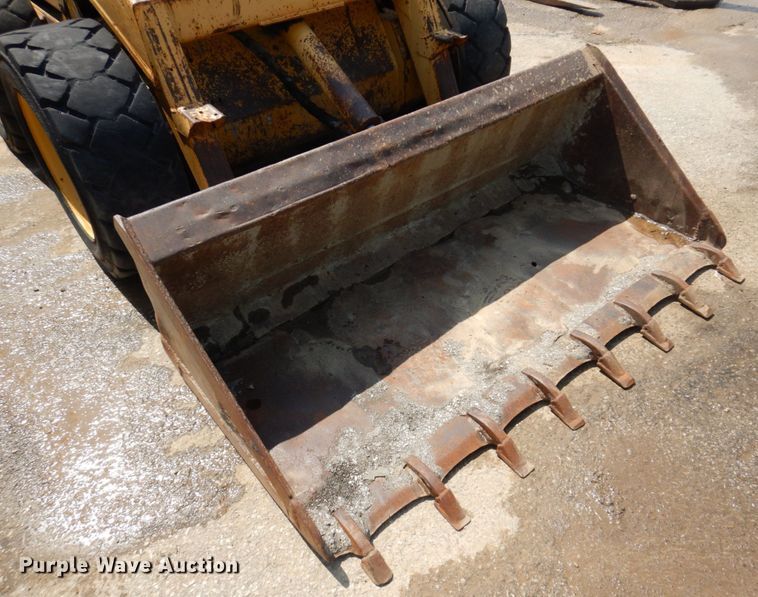 image for item DM7370 John Deere 675B  skid steer loader