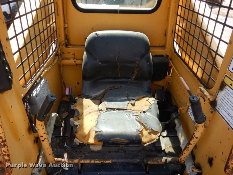 image for item DM7370 John Deere 675B  skid steer loader