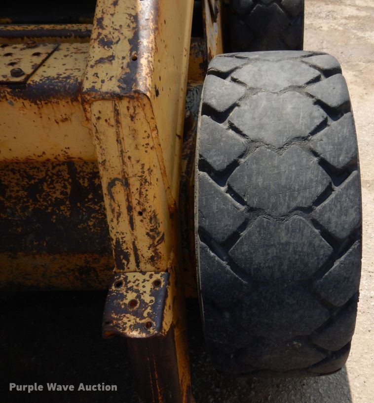 image for item DM7370 John Deere 675B  skid steer loader