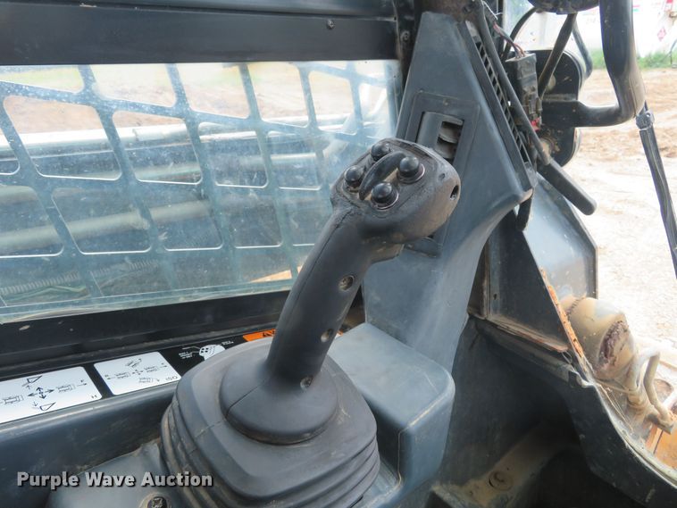 image for item DM7441 2013 John Deere 329E  tracked skid steer loader