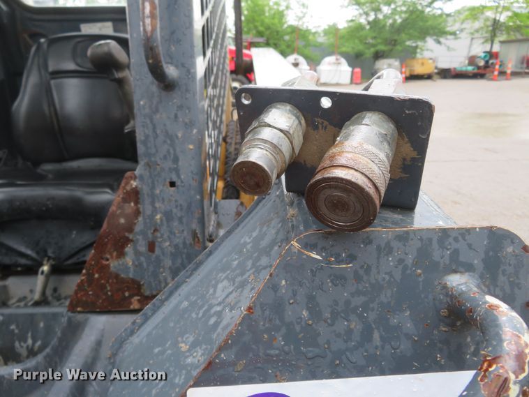 image for item DM7442 2010 John Deere 319D  tracked skid steer loader