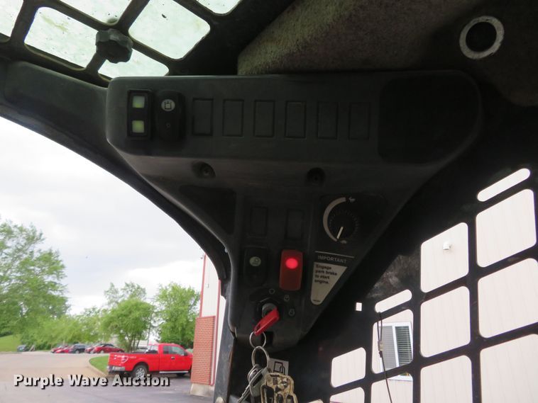 image for item DM7442 2010 John Deere 319D  tracked skid steer loader