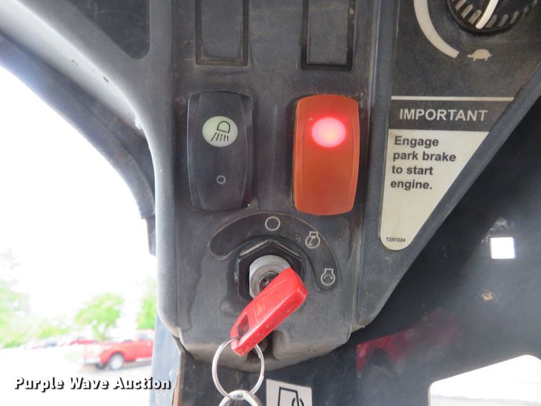 image for item DM7442 2010 John Deere 319D  tracked skid steer loader