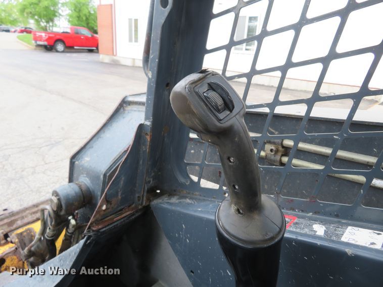 image for item DM7442 2010 John Deere 319D  tracked skid steer loader