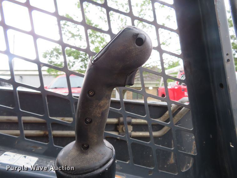 image for item DM7442 2010 John Deere 319D  tracked skid steer loader