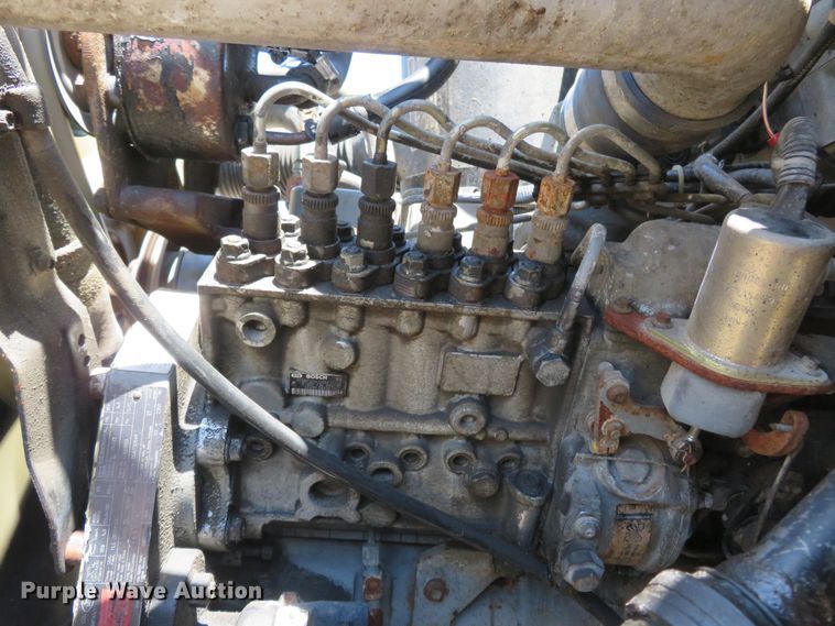 image for item DM7460 1997 Ford F800  flatbed truck