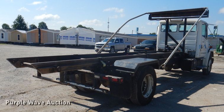 image for item DJ3828 1994 Freightliner FL70  roll-off container truck