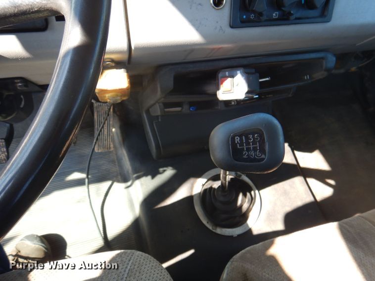 image for item DJ3828 1994 Freightliner FL70  roll-off container truck