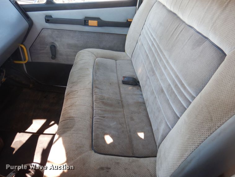 image for item DJ3828 1994 Freightliner FL70  roll-off container truck