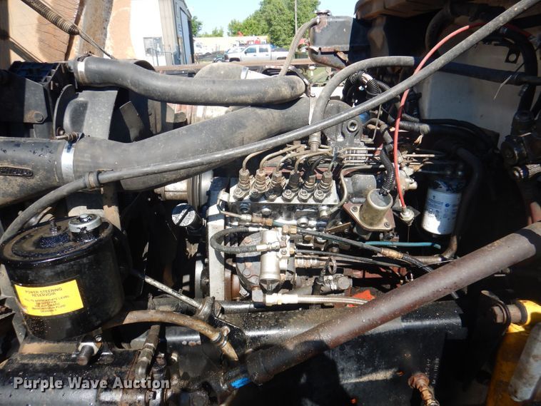 image for item DJ3828 1994 Freightliner FL70  roll-off container truck