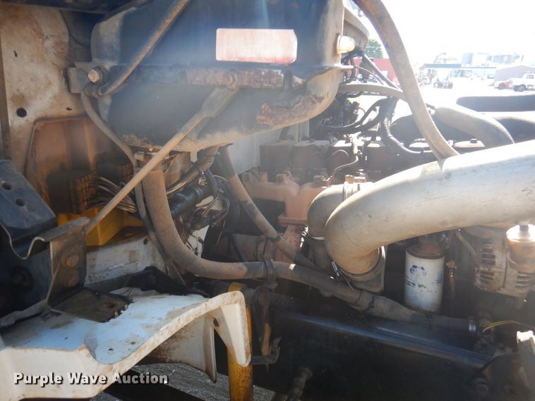 image for item DJ3828 1994 Freightliner FL70  roll-off container truck