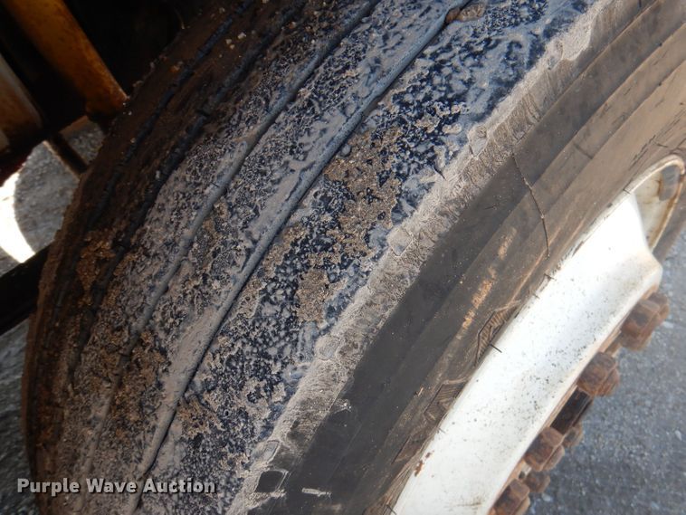 image for item DJ3828 1994 Freightliner FL70  roll-off container truck