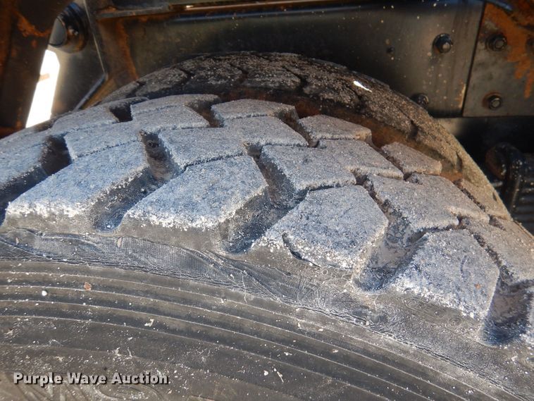 image for item DJ3829 1996 Mack MR  roll-off container truck