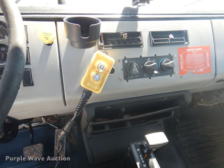 image for item DJ3830 1998 Freightliner FL70  roll-off container truck