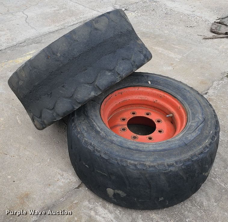 image for item KF9055 (2) 12-16.5 tires and wheels