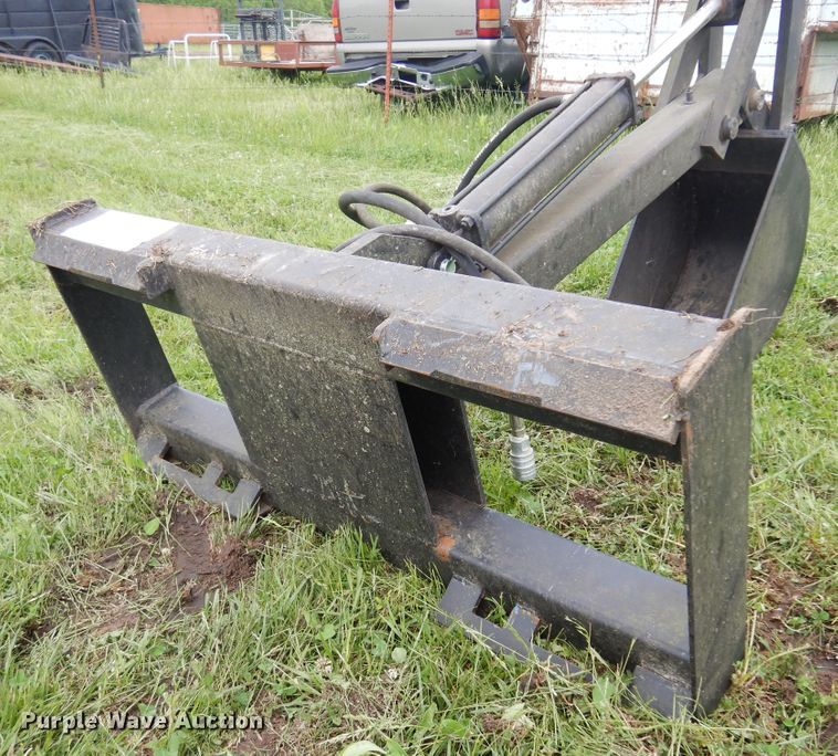 image for item DK0974 Skid steer backhoe