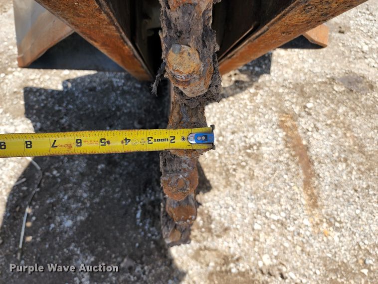 image for item DL6548 Caterpillar SW460B-80  skid steer rock saw