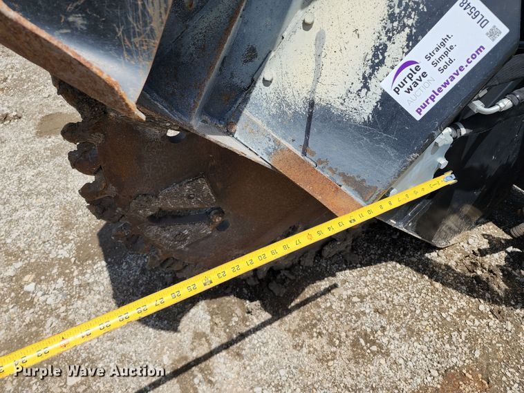 image for item DL6548 Caterpillar SW460B-80  skid steer rock saw