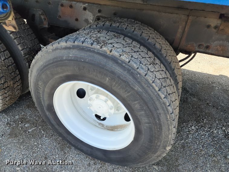 image for item DL6555 2007 Sterling L-Line  dump flatbed truck