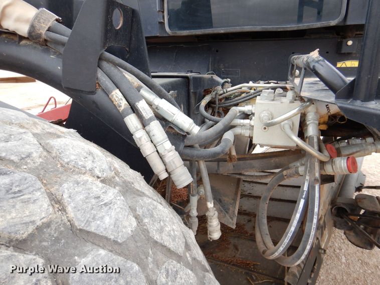 image for item DP4048 2016 MacDon M205  windrower