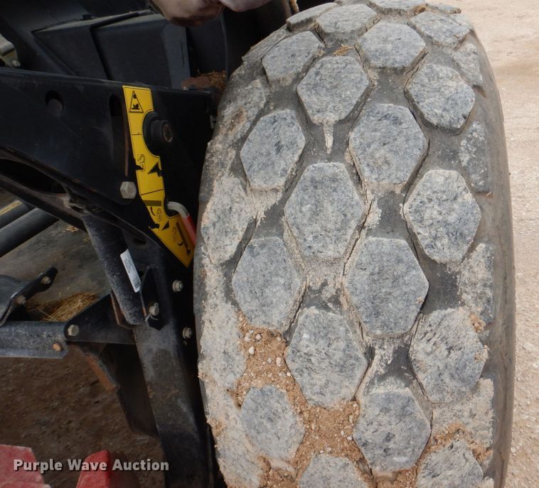 image for item DP4048 2016 MacDon M205  windrower