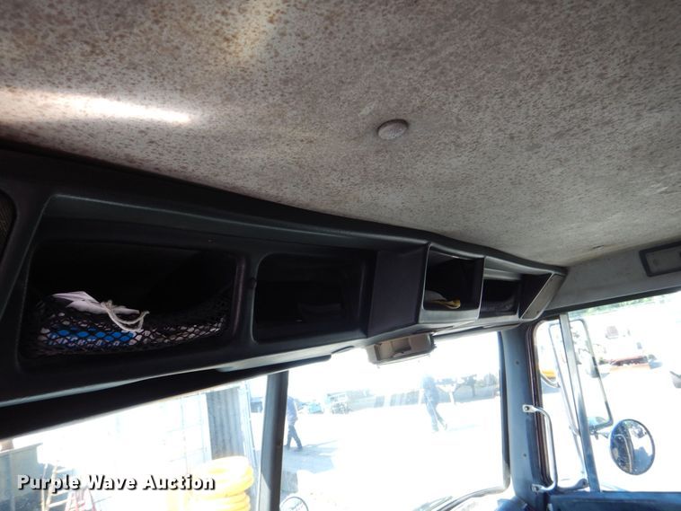 image for item DS8043 1997 Volvo Autocar  vacuum truck